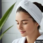 Home 22 저자극 두피 스케일링 제품 추천 - A serene spa scene featuring a woman with medium-length dark hair gently exfoliating her scalp using...